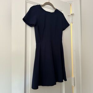 Flattering navy sleeveless dress